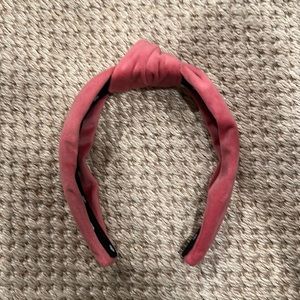 One Lele Sadoughi pink velvet headband. EUC. Includes dust bag.